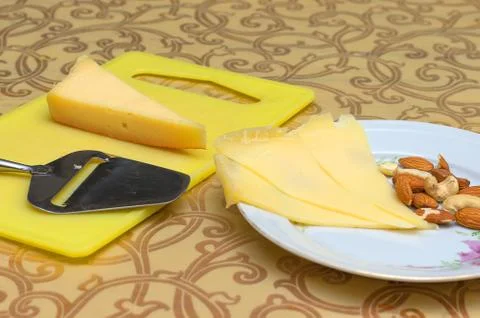 Slicing cheese Close-up Stock Photos
