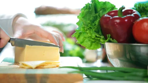Slicing cheese Stock Footage