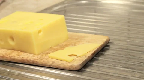 Slicing cheese Video stock 33743159