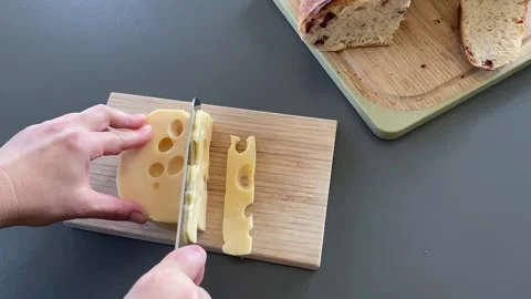 Slicing cheese precisely now Stock Footage 341983287
