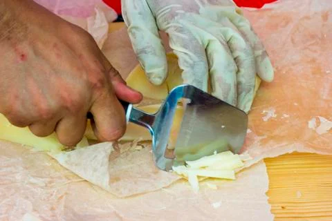 Slicing cheese for tasting Stock Photos
