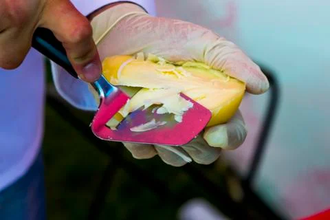 Slicing cheese for tasting Stock Photos