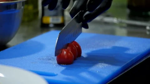 Slicing Cherry Tomatoes Stock Footage 131631597