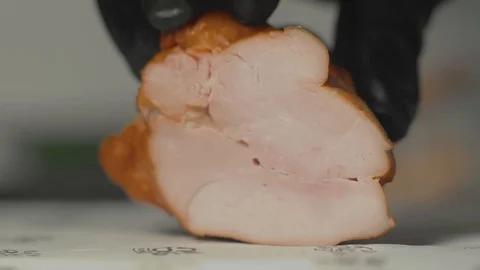 Slicing chicken for cooking Stock Footage 102510182