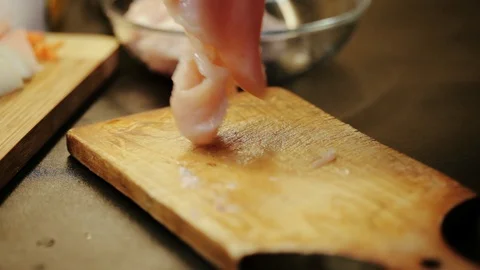 Slicing chicken Stock Footage 98361456
