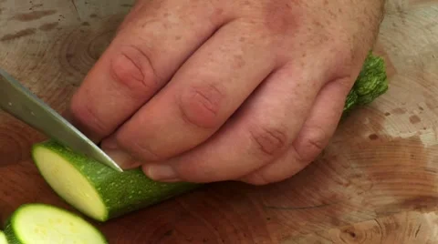 Slicing a courgette Stock Footage 8572834