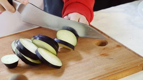 Slicing courgettes for cooking Stock-Footage 105398791