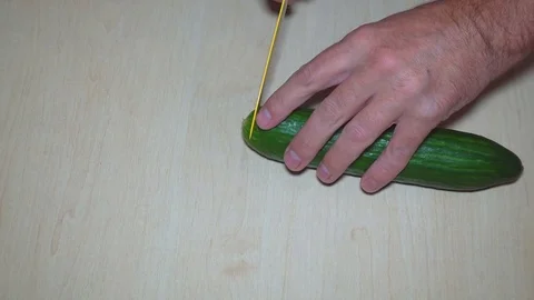 Slicing cucumber and lettuce Stock Footage 81361830