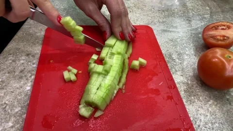 Slicing cucumber Stock Footage 123967880