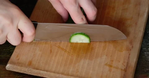 Slicing cucumber Stock Footage 131199969