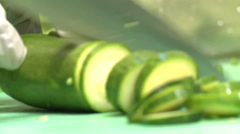 Slicing Cucumbers 1 Stock Footage 57701537
