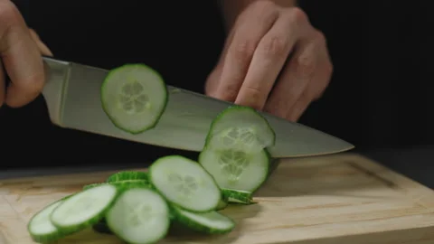 Slicing cucumbers Vídeos de archivo 279964629