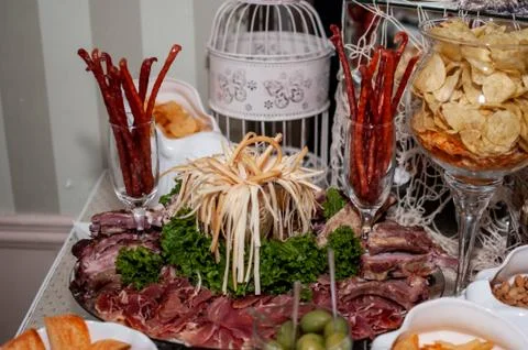 Slicing different varieties of meat Stock Photos