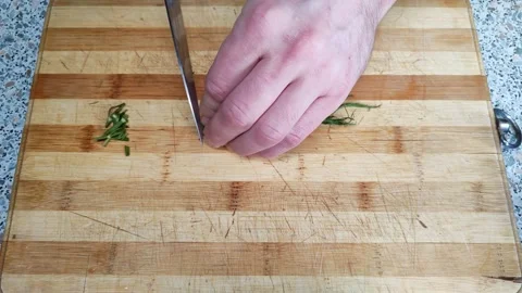 Slicing dill on a board Stock Footage 167934097