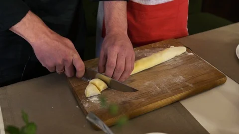 Slicing dough to make dumplings Stock Footage 123651002