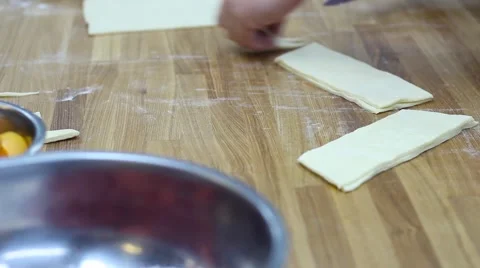 Slicing the dough for the pie Stock Footage 64682546