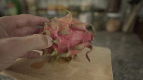 Slicing a dragonfruit Stock Footage 113190272