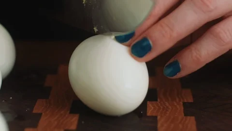 Slicing an Egg in Half Stock Footage 85476124