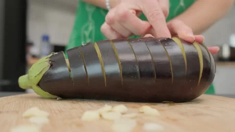 Slicing Eggplant in Cooking Kitchen Video stock 341458713