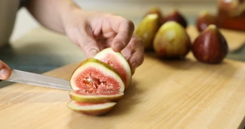 Slicing figs to make fresh fig preserve Stock-Footage 115931218