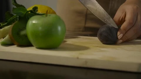 Slicing figs on the table Stock Footage 140601523