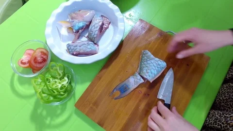 Slicing fish from the barracuda. Stock Footage 76787054