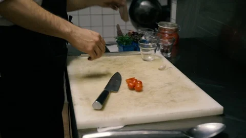 Slicing fish fillet in the kitchen Stock Footage 86487112