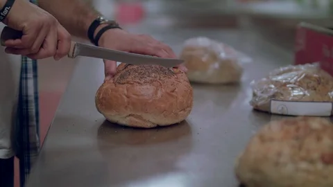 SLICING FRESH BREAD 스톡 동영상 108046882