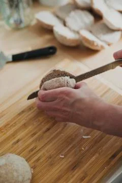 Slicing up fresh Bread Stock Photos