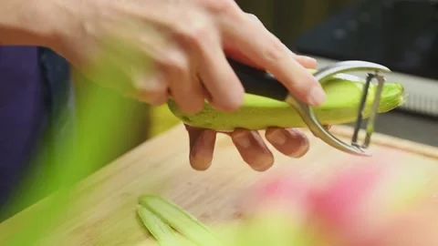 Slicing  fresh courgette, slow motion. Stock Footage 165616012