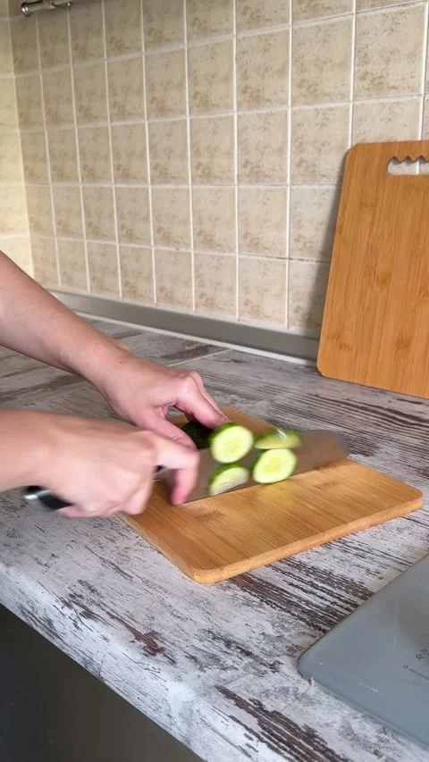 Slicing Fresh Cucumber Close Up Stock-Footage 340340848