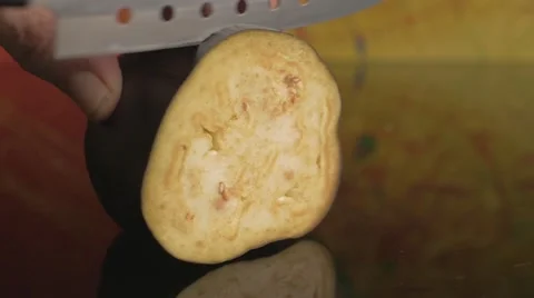 Slicing a fresh eggplant Stock Footage 62598212