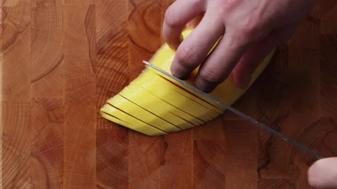 Slicing Fresh Mango Into Thin Slices Top View Close Up Видео 335081989