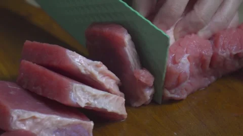 Slicing Fresh Meat Stock Footage 290106023