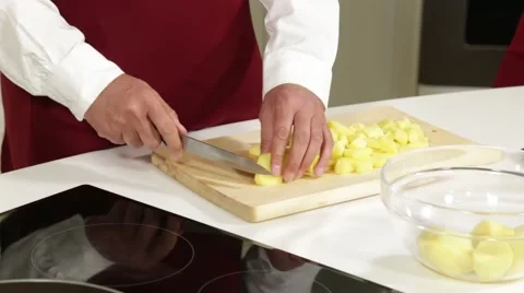Slicing fresh potatoes Stock Footage 49781637