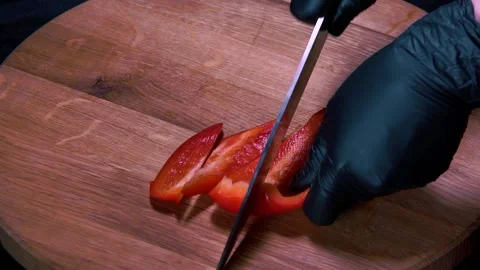 Slicing fresh red bell pepper Stock Footage 240201860