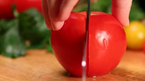 Slicing fresh tomato Stock Footage