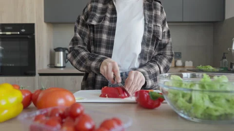 Slicing Fresh Vegetables On Kitchen Counter For Healthy Homemade Salad 스톡 동영상 318956499