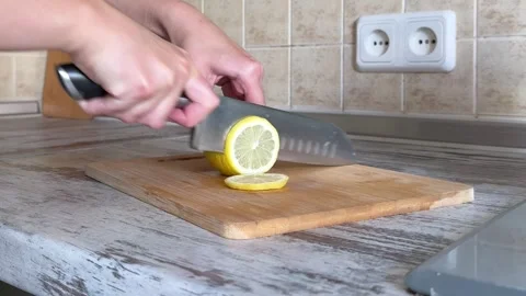 Slicing Fresh Yellow Lemon Close Up 動画素材 340341036