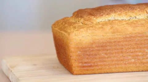 Slicing Freshly Baked Bread on a Cutting Board Stock Footage 51026256
