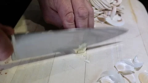 Slicing garlic Stock Footage 132648647