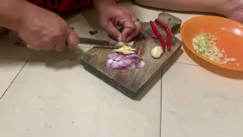 Slicing garlic Stock Footage 219448031