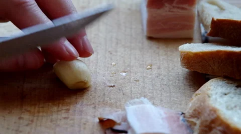 Slicing garlic with a knife Stock Footage 36782567