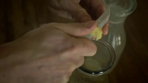 Slicing ginger Stock Footage 76948811
