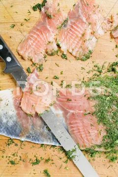 Slicing gravad lax Stock Photos