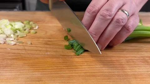 Slicing Green Onion For Garnish Stock Footage 318700340