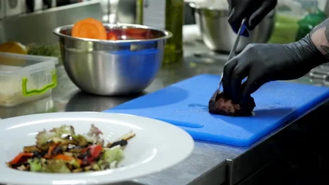 Slicing Grilled Meat Stock Footage 131634451