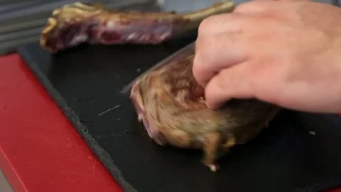 Slicing Grilled Ribeye Steak Stock Footage 83590431
