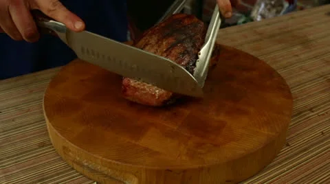 Slicing Grilled Rump Roast Video stock 22575952
