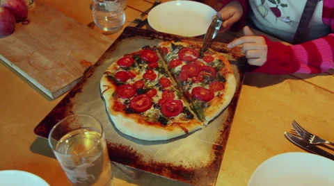Slicing a homemade pizza Stock Footage 45499841